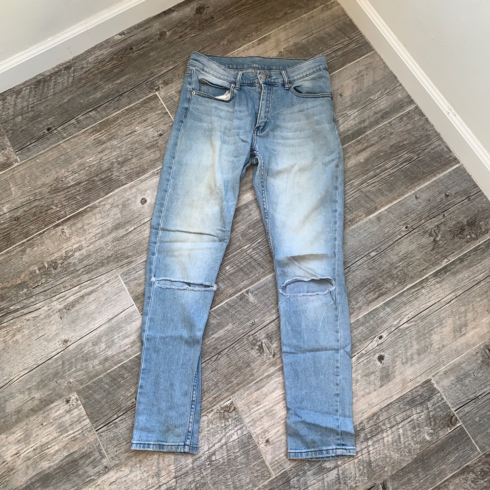 Cheap Monday jeans with cut knees